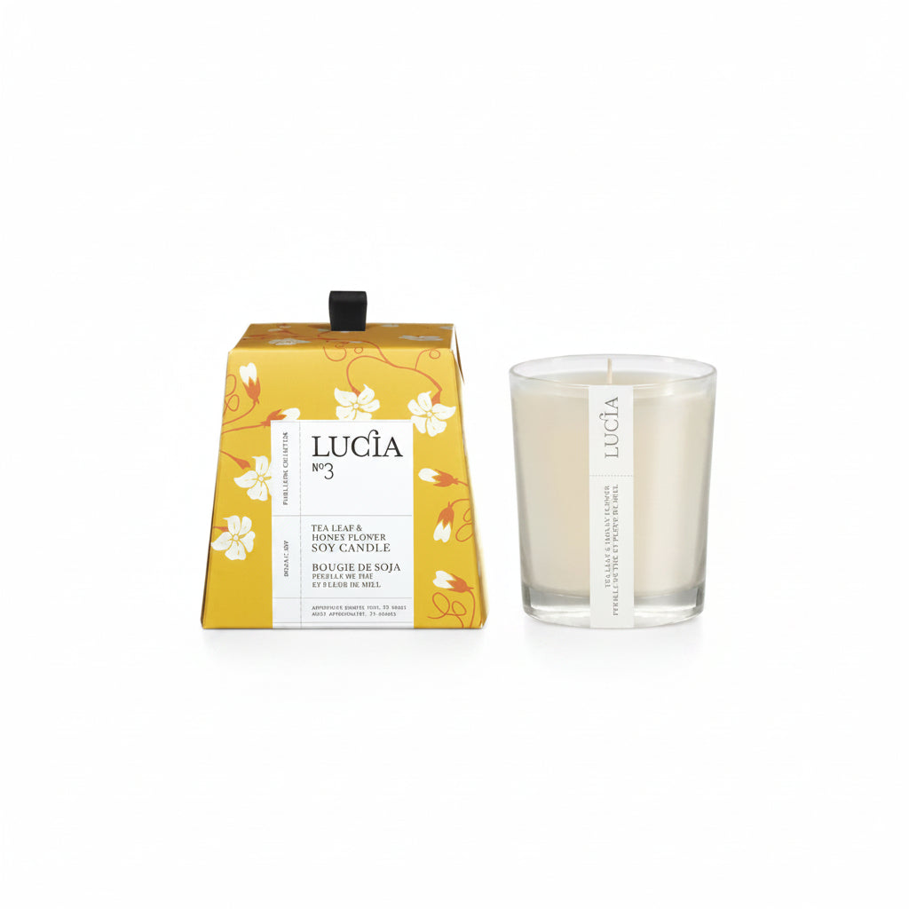 Lucia candle and packaging on a white background