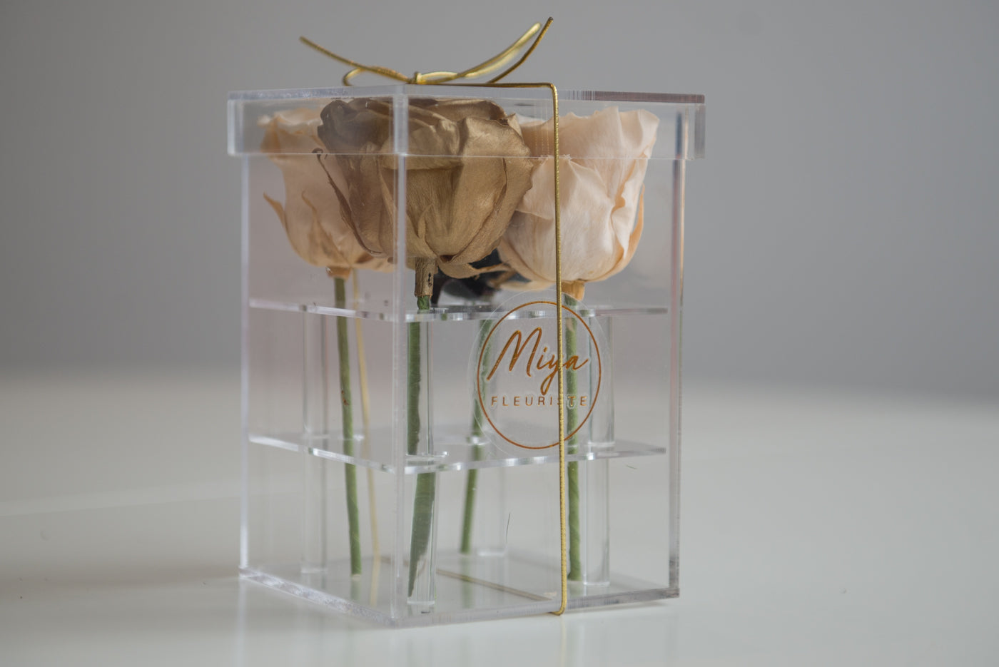 Four roses in an acrylic box image 2